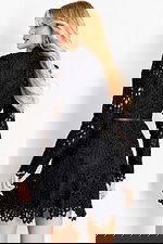 Black lace mini dress with high neckline and long sleeves