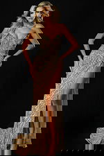 Front view of strapless embellished gown with high slit and sequin pattern