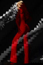 Elegant sleeveless jumpsuit with soft ruffle accents and open back