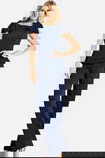 Sophisticated navy outfit with layered shoulders and modern tailored fit