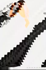 Off the shoulder black satin gown with structured bodice and peplum detail