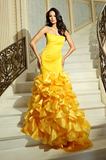 Structured strapless gown with dramatic flared hem