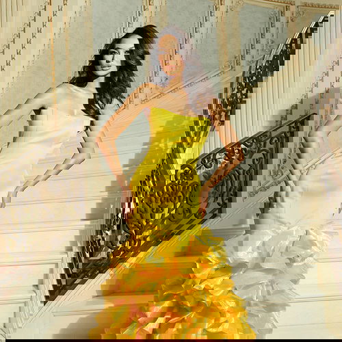 Structured strapless gown with dramatic flared hem