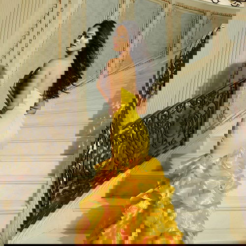 Strapless fit and flare gown with tiered ruffle skirt