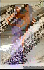 Sheer embroidered gowns with pastel and dark floral beadwork side by side