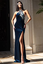 Navy halter gown with silver beaded embellishments and slit