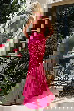 Back view of open criss cross gown with ruched detailing