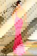 Sparkly halter evening dress featuring rhinestone details and crisscross straps