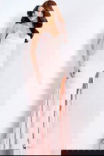 Light pink prom gown with high slit and sparkle details