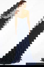 Back view of strapless lace gown with fitted bodice and soft train