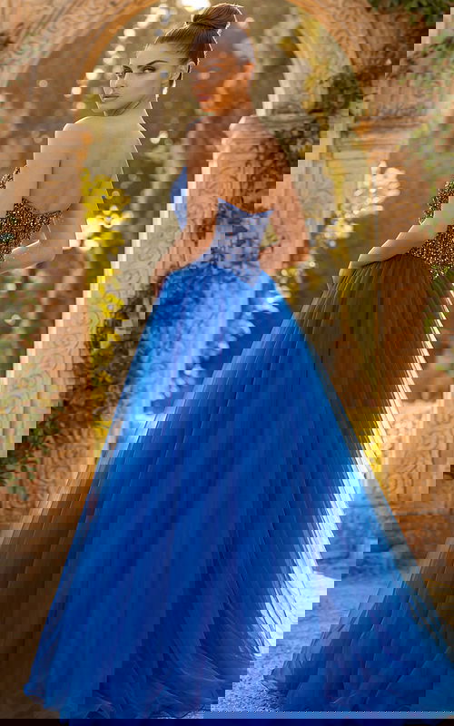 Back view of strapless beaded gown with layered tulle skirt and open back