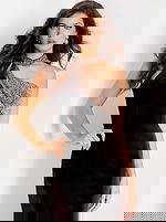 Elegant brown gown featuring crystal embellishment and open back design