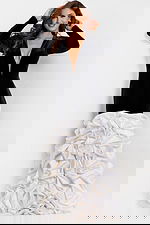 Formal velvet gown with plunging neckline and satin detailing