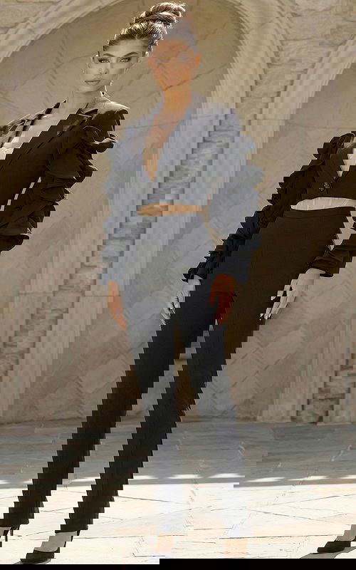 Elegant fitted jumpsuit with strapless top and high waisted straight leg pants