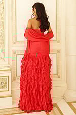 Back view of strapless ruffled gown with draped shawl