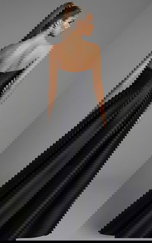 Back view of strapless full skirt ball gown with structured bodice