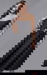 black strapless midi dress with fitted bodice and smooth pleated skirt