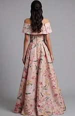 Back view of off shoulder floral gown with button detail and pleated skirt