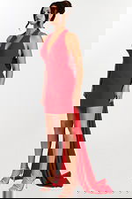 Red halter mini dress with dramatic back train and deep V neckline