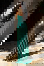 Metallic emerald gown with sweetheart neckline and ruched design