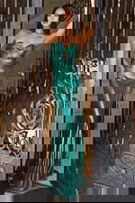 Emerald strapless gown with cutout bodice and high slit