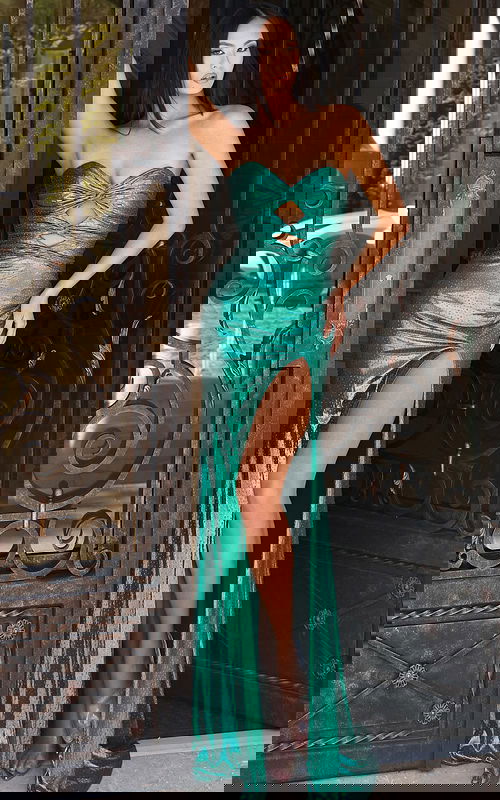 Strapless green gown with sleek silhouette and shimmering finish