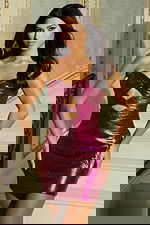 Glamorous party dress with metallic texture and body-hugging fit