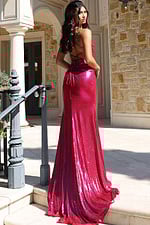 Shiny fuchsia gown with thigh-high slit and form-fitting silhouette