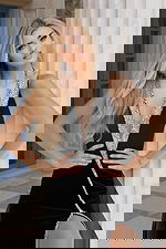 Backless velvet gown with crystal straps and dramatic open back