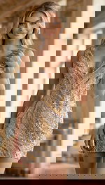 Front view of a beaded mini dress with a plunging neckline and sculpted silhouette