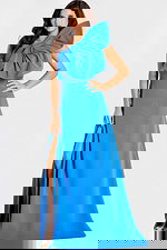 One shoulder gown with an oversized bow detail and high slit, featuring a sleek fitted silhouette and modern statement design.