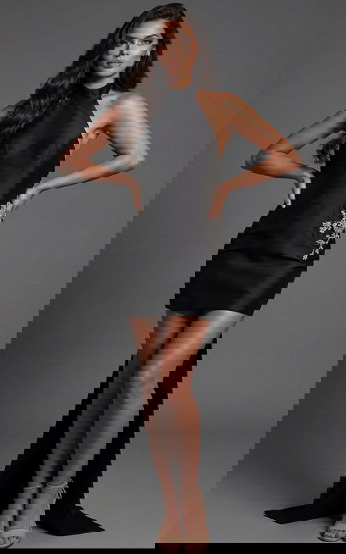 halter mini dress with fitted silhouette and side embellishment