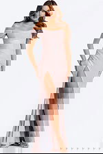 Off-the-shoulder gown with ruched bodice and high side slit.