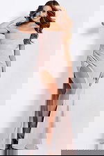 Elegant fitted formal dress featuring draped details and floor-length skirt.