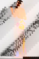 Sleeveless formal dress with open back and artistic pattern