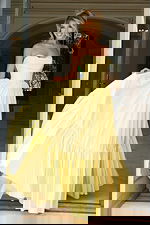 strapless ball gown with gathered tiered skirt