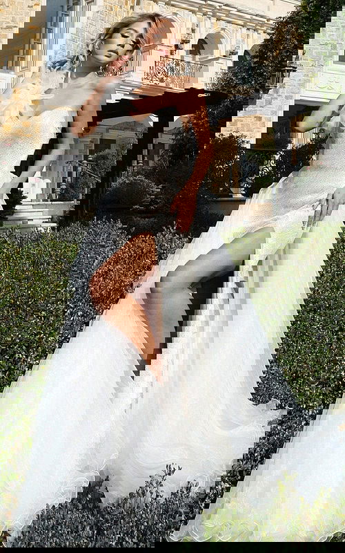 One shoulder gown with oversized floral detail and fitted bodice