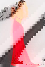 Red sequin halter gown with floor-length skirt