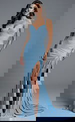 Front view of sleeveless floor length gown with V neckline, high slit, and scattered bead embellishments