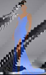 Front view of sleeveless V neck gown with slim silhouette, high slit, and delicate all over beading