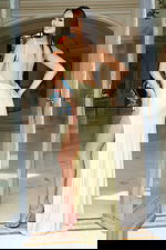 Back view of open back rhinestone gown with ruched detailing