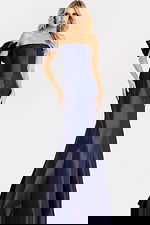 One-shoulder satin gown with structured ruffle accent and flared mermaid hemline.