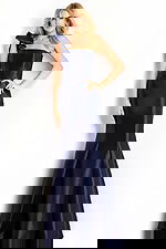 One-shoulder satin gown with structured ruffle detail and fitted mermaid silhouette.