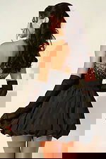 Elegant black party dress with rhinestone details and voluminous short skirt for formal events and cocktail parties