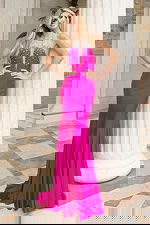 Fitted halter prom dress with plunging neckline and shimmer beadwork