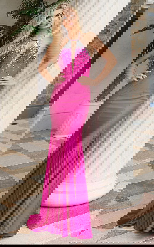 Pink evening gown featuring plunging keyhole front and halter neckline