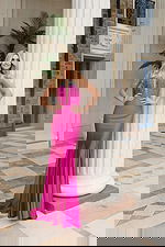 Open back halter prom dress with rhinestone straps and ruched detailing