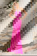 Pink prom dress featuring structured bodice and sleek mermaid fit