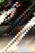 Jovani 48126 off white and royal blue V neck spaghetti strap fitted gown with beaded lily floral embellishments, high thigh slit, and sweep train