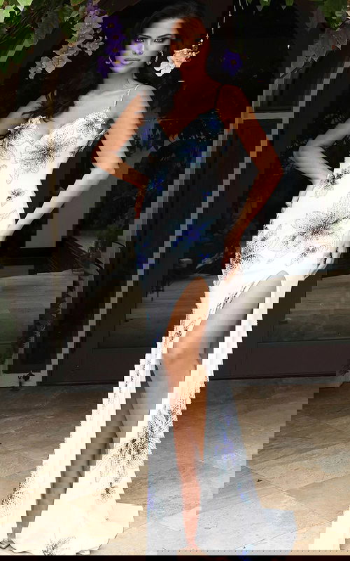 Jovani 48126 off white and royal blue V neck spaghetti strap fitted gown with beaded lily floral embellishments, high thigh slit, and sweep train